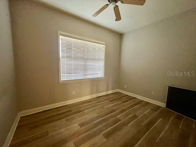 720 Celebration Avenue, Unit 235 Celebration, FL 34747 - Photo 6 of 16 a view of an empty room with a window