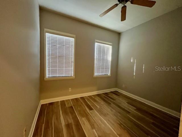 720 Celebration Avenue, Unit 235 Celebration, FL 34747 - Photo 8 of 16 a view of wooden floor in a room