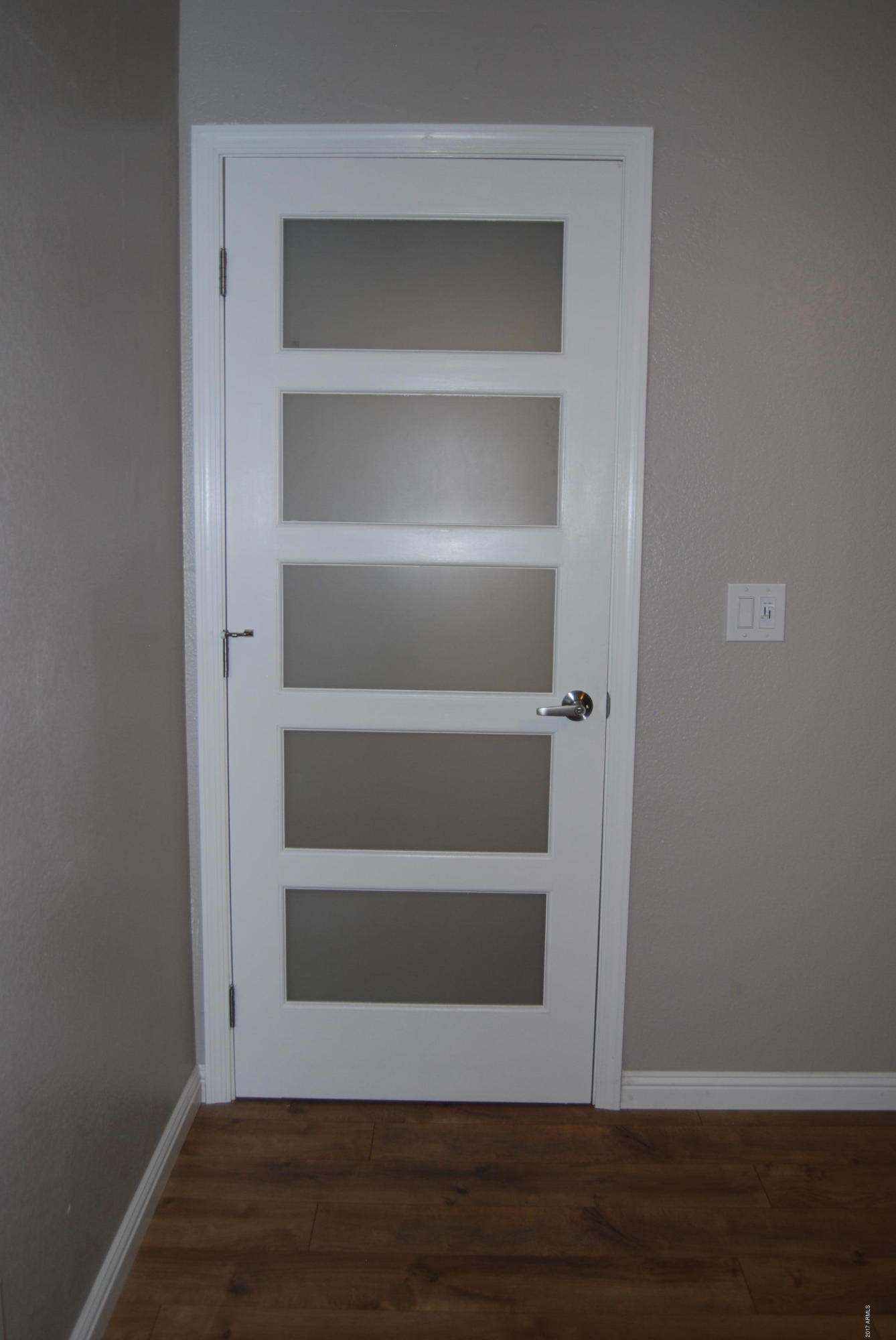 154 West 5th Street, Unit 248 Tempe, AZ 85281 - Photo 14 of 18 a view of a room with rack on the wall