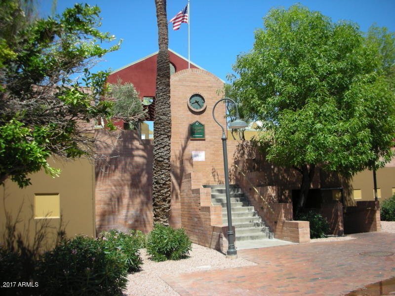 154 West 5th Street, Unit 248 Tempe, AZ 85281 - Photo 6 of 18 a front view of a house with a yard
