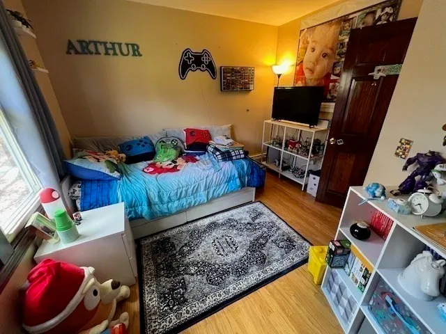 a bed room with a bed and a couch