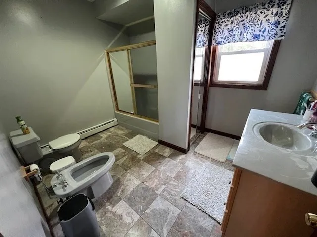 a living room with a couch and a stove