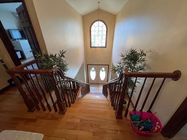 a view of entryway with wooden floor