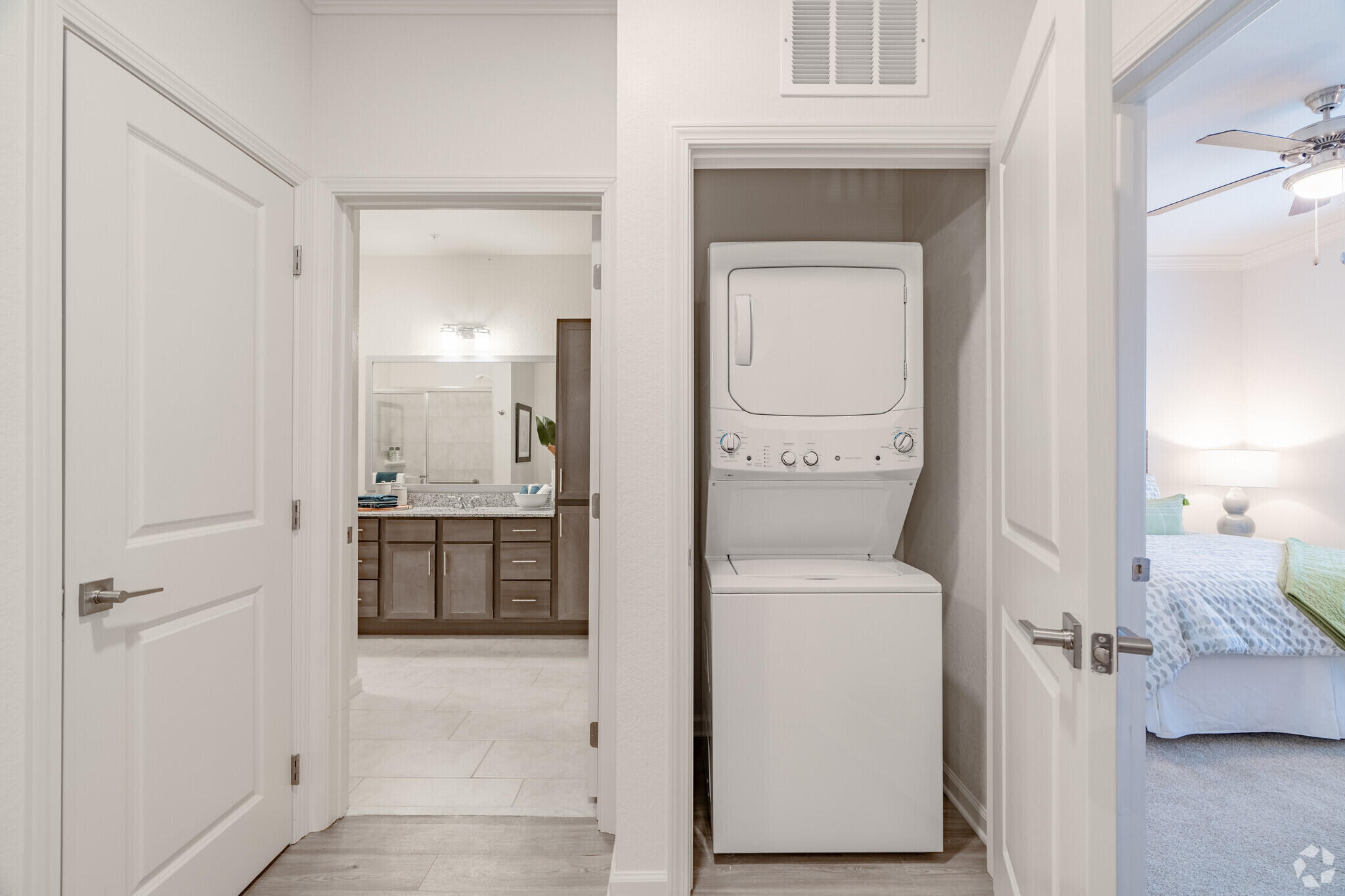 1924 Northwest Federal Highway, Unit 1103 Stuart, FL 34994 - Photo 14 of 19 a en suite bathroom with a toilet sink and mirror
