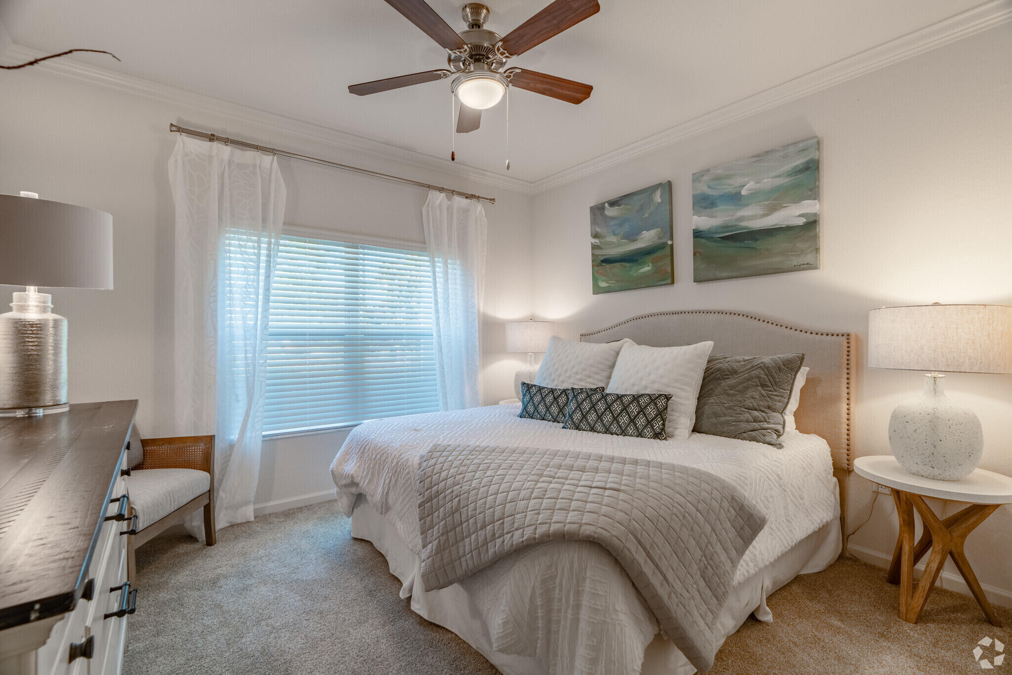 1924 Northwest Federal Highway, Unit 1103 Stuart, FL 34994 - Photo 9 of 19 a bedroom with a large bed and a window