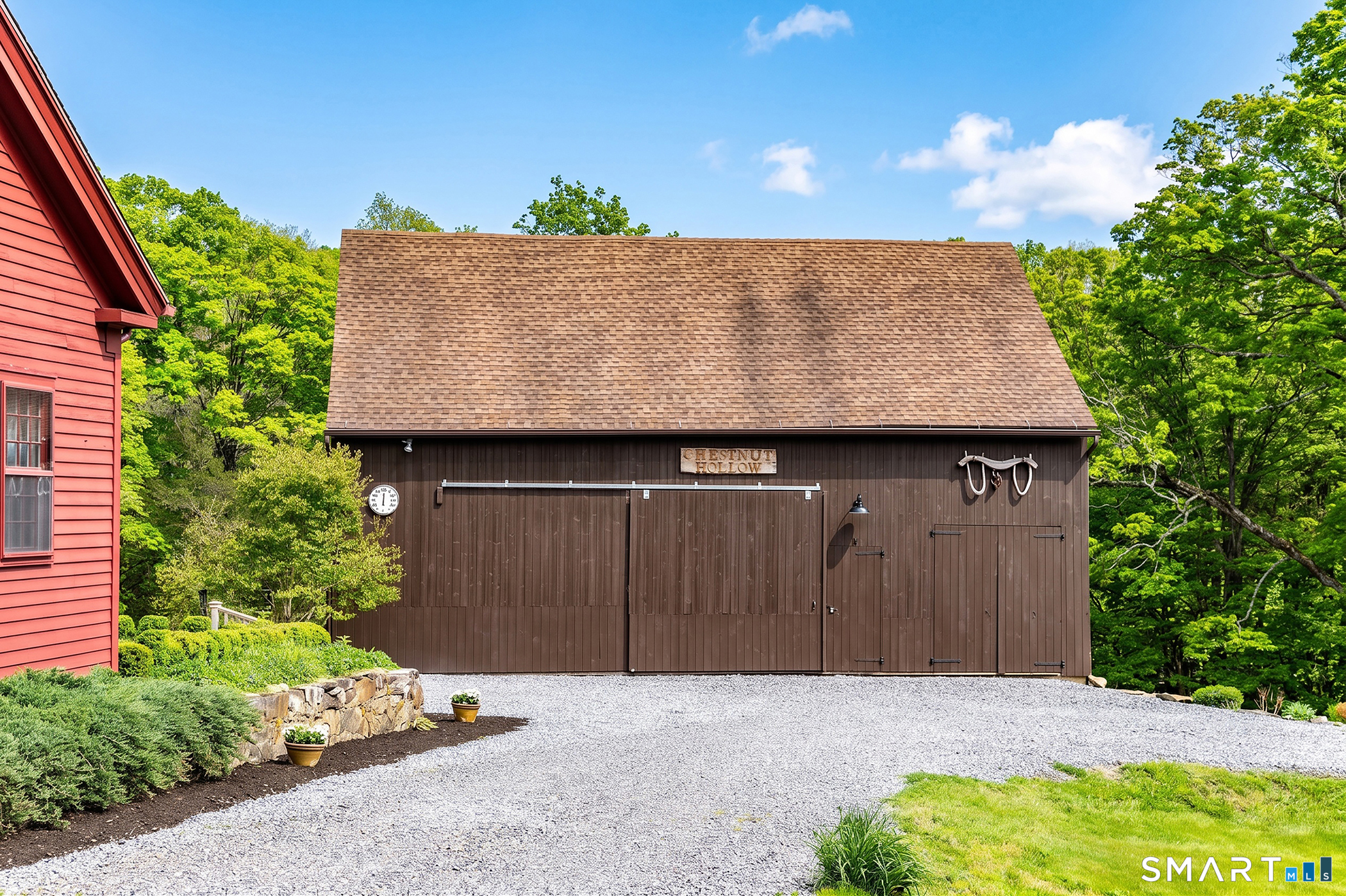 253 Bacon Pond Road Woodbury, CT 06798 - Photo 33 of 35 Large barn with stables below.
