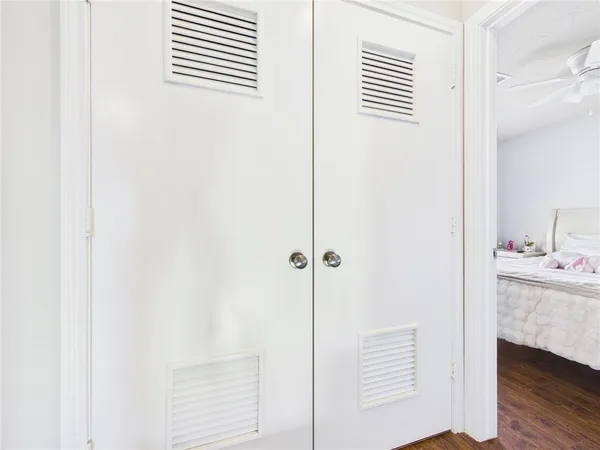 a view of a bedroom from the hallway