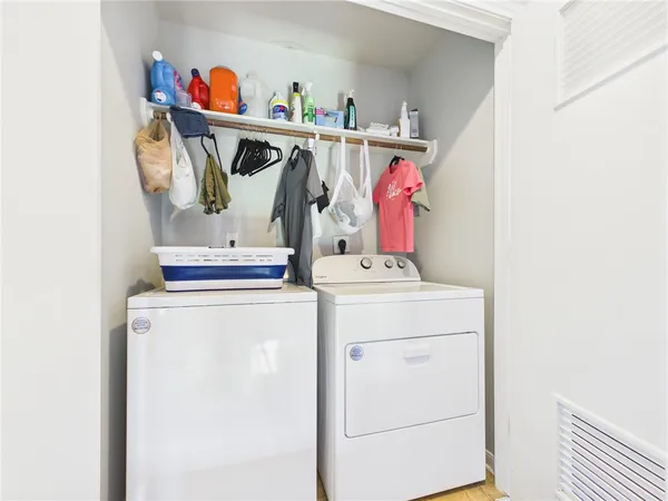 a utility room with dryer and washer