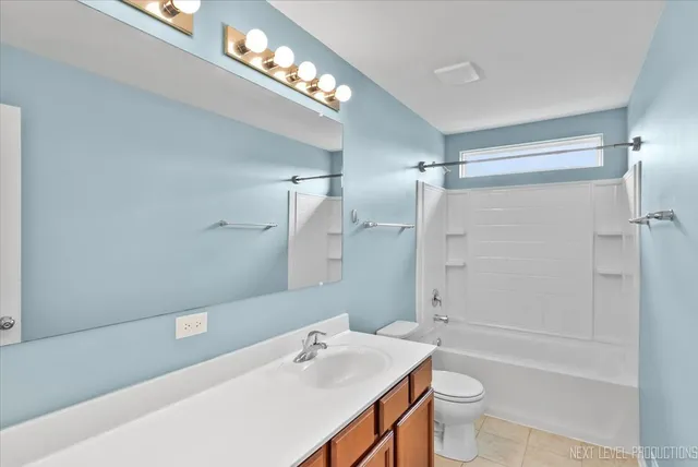 a room with lots of counter space and a sink