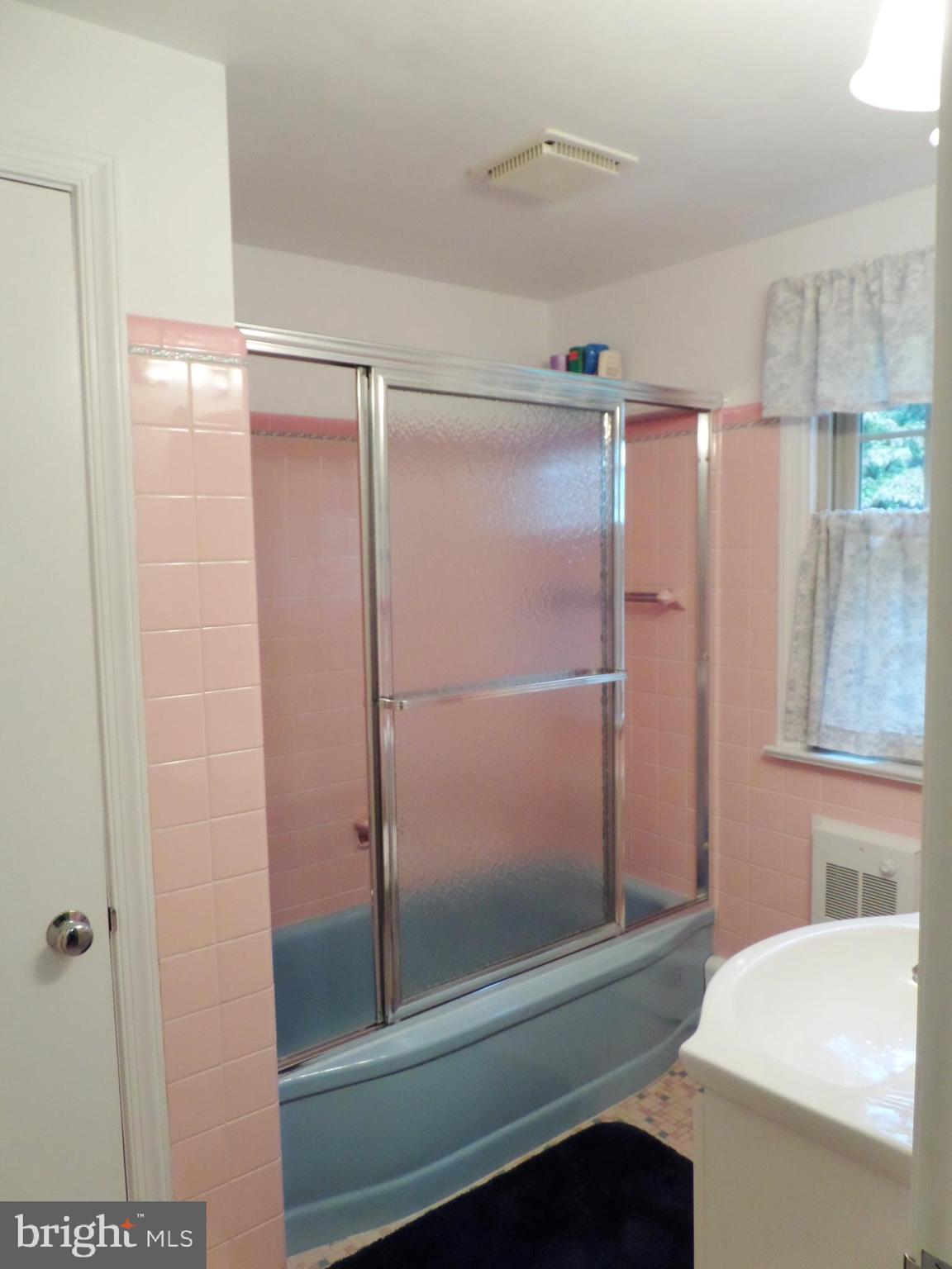 411 Custis Road Glenside, PA 19038 - Photo 46 of 52 Hall Bathroom with tiled tub with shower