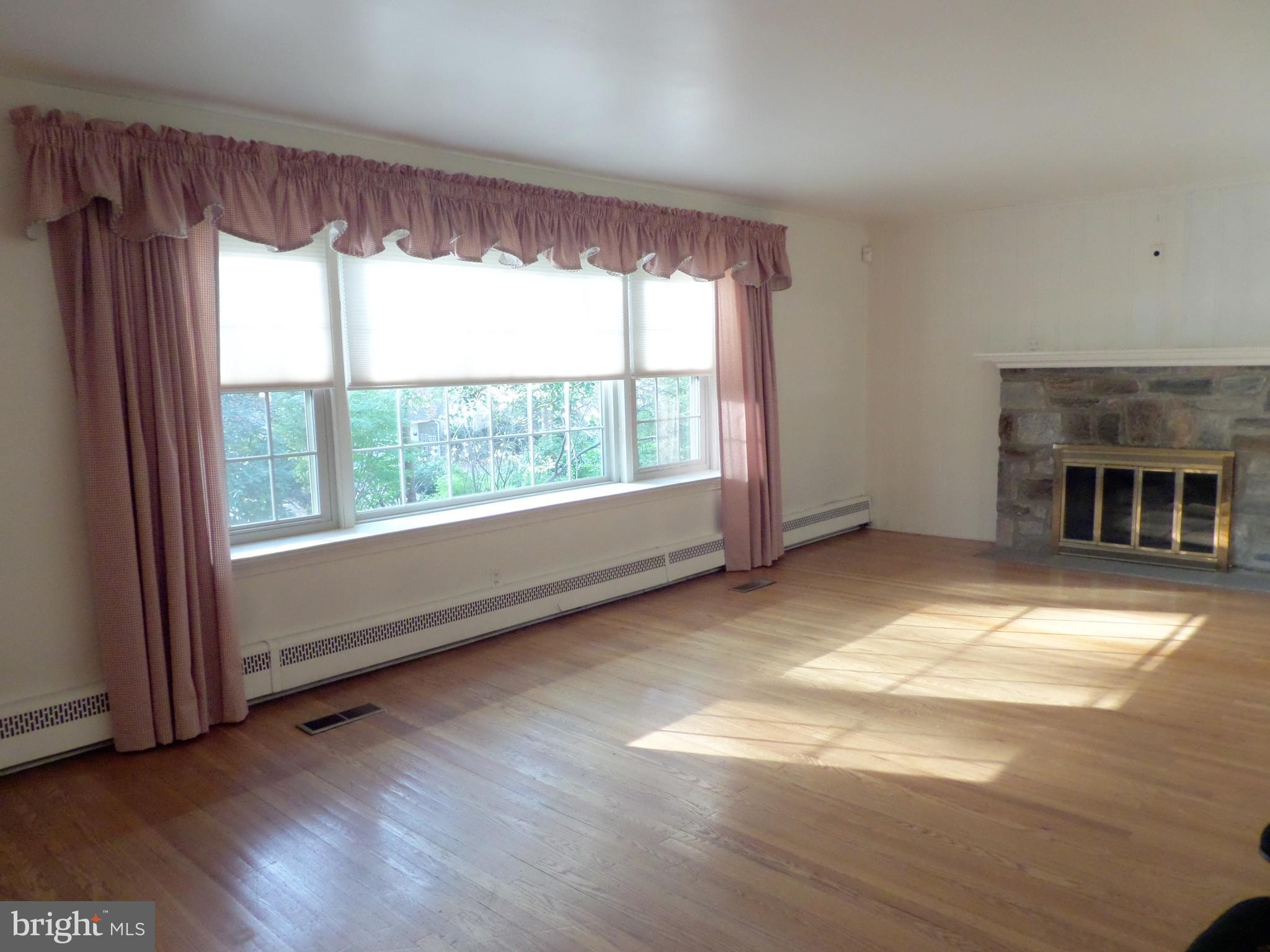 411 Custis Road Glenside, PA 19038 - Photo 8 of 52 Living Room Bathed in natural light
