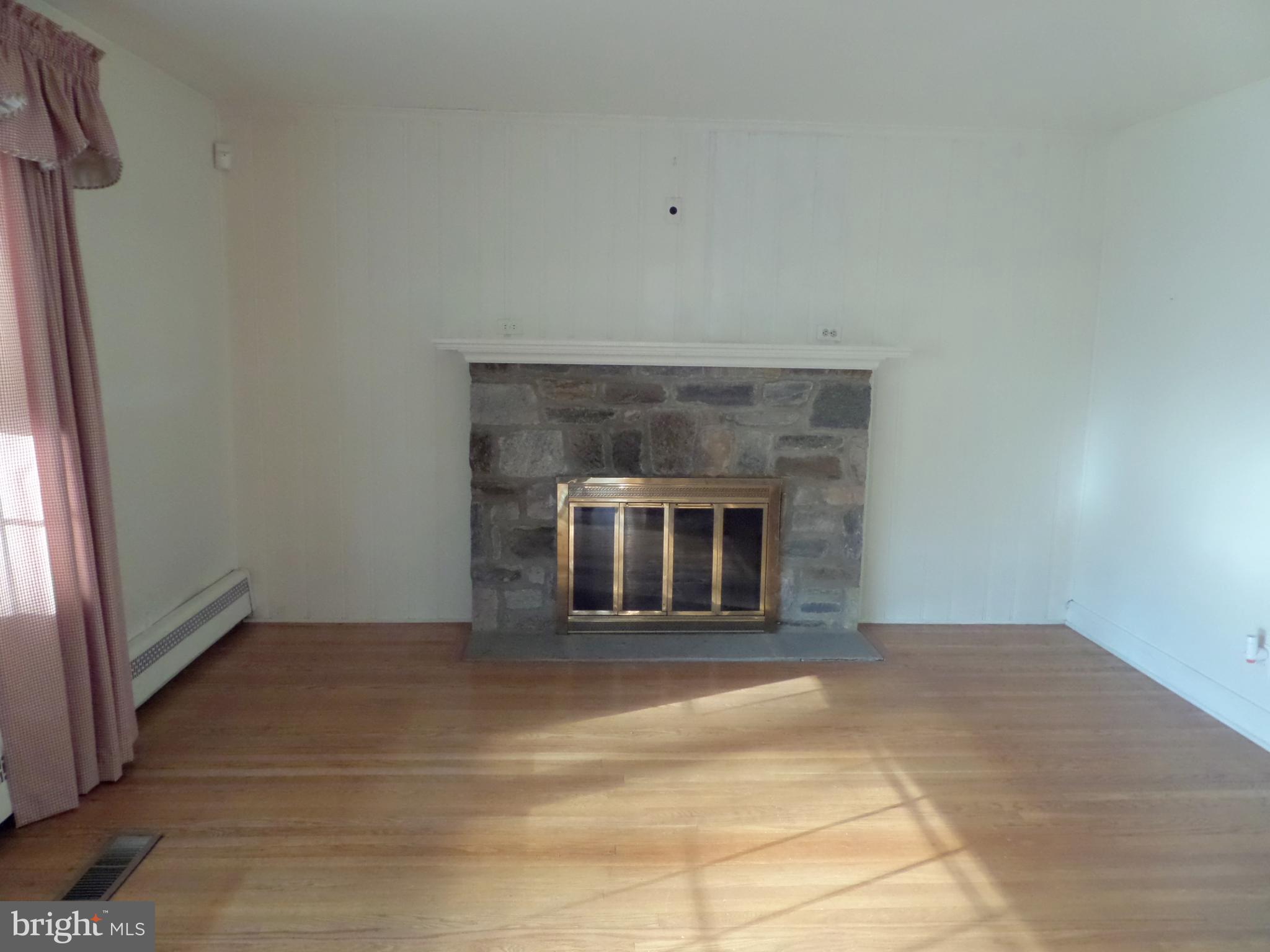 411 Custis Road Glenside, PA 19038 - Photo 10 of 52 Stone wood burning Fireplace