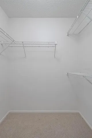 a view of a room with racks on the wall