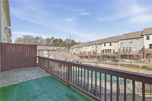 a view of a street from a balcony