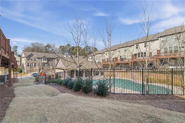 a view of a backyard with a building