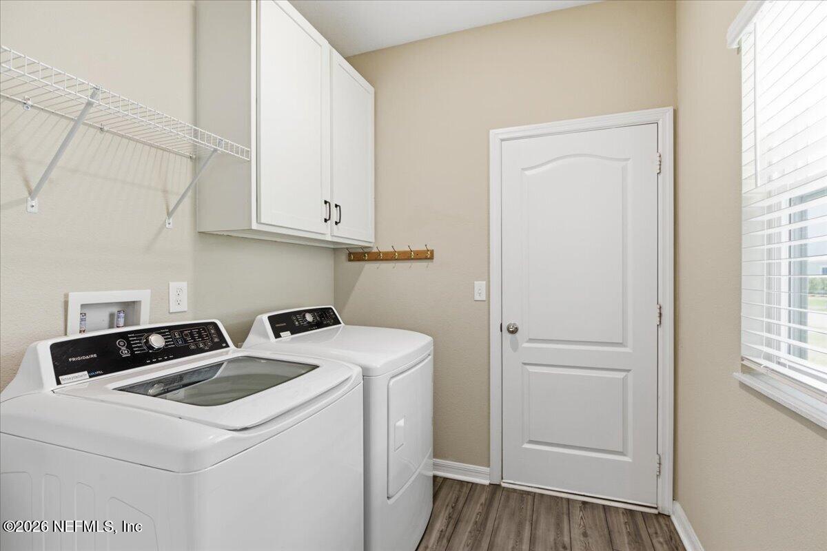 51 Tree Frog Way St. Augustine, FL 32095 - Photo 17 of 21 a utility room with dryer and washer