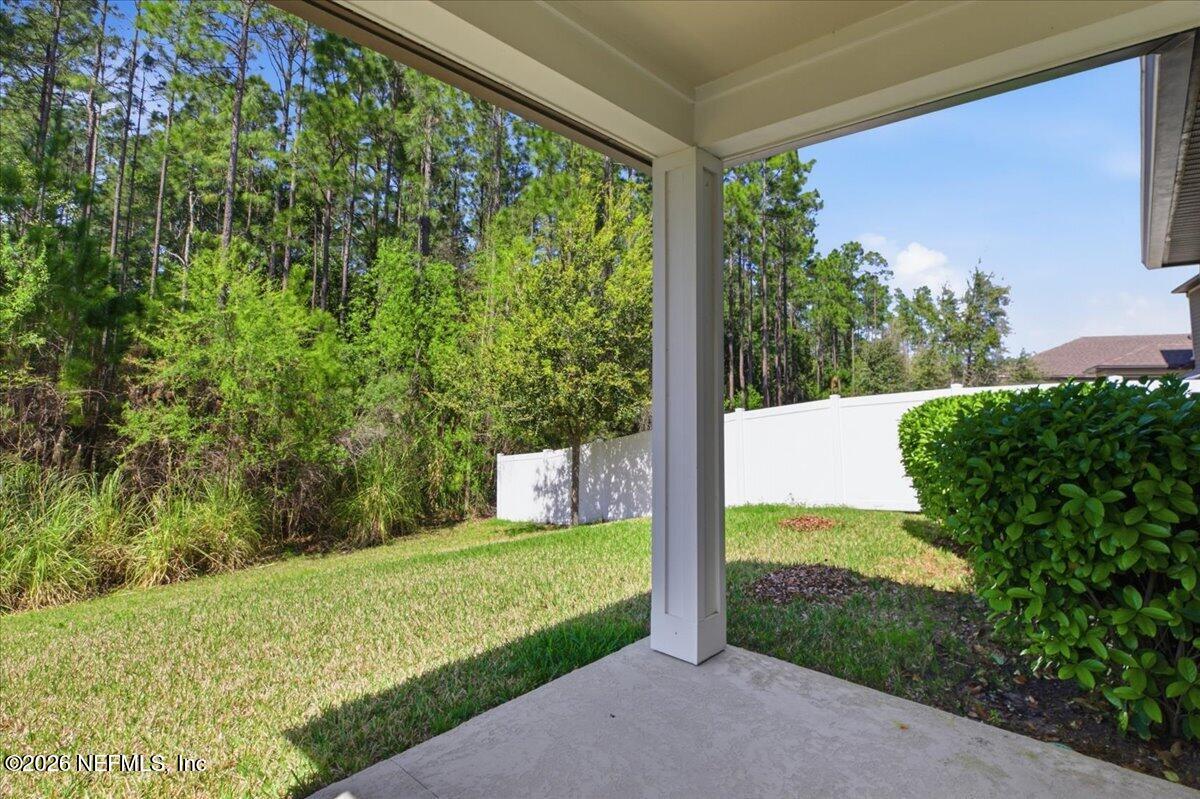 51 Tree Frog Way St. Augustine, FL 32095 - Photo 18 of 21 a view of a back yard from a balcony