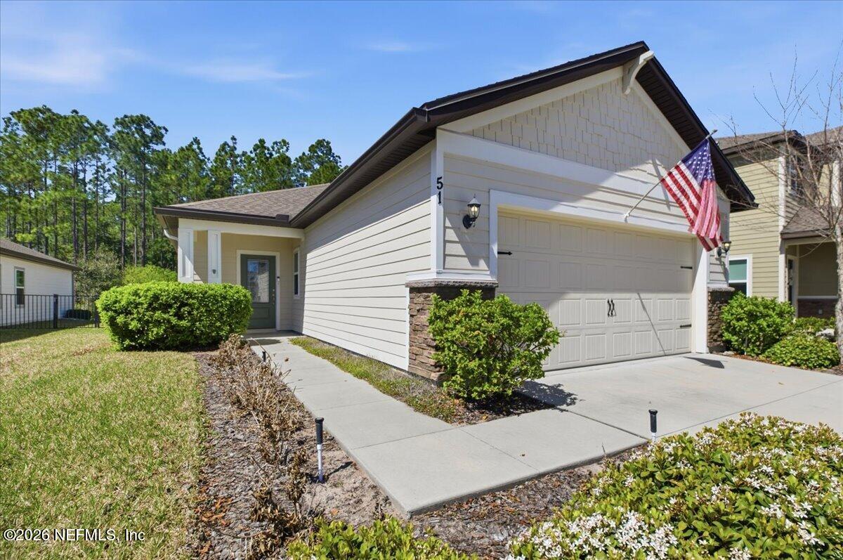 51 Tree Frog Way St. Augustine, FL 32095 - Photo 2 of 21 a view of backyard of house