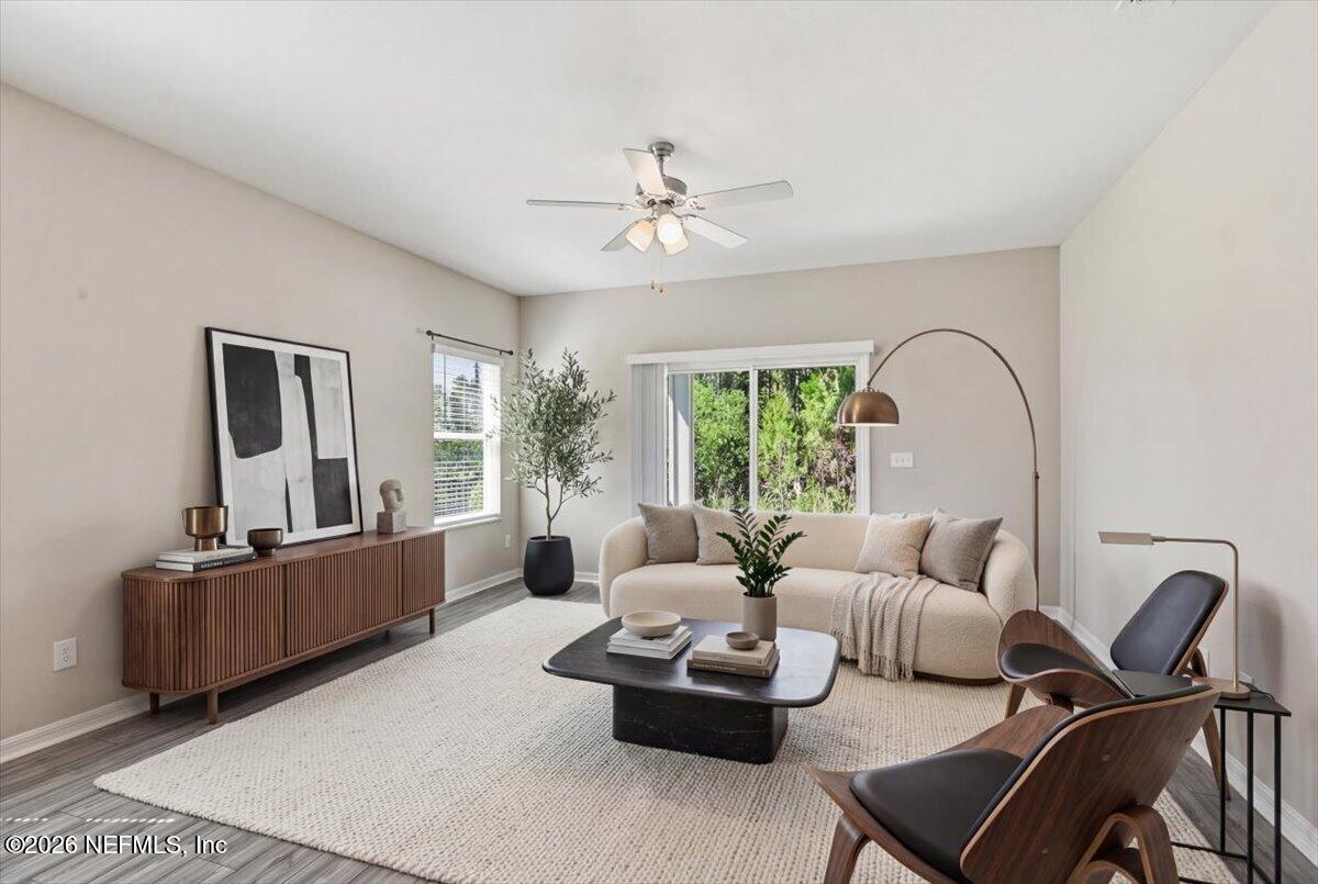 51 Tree Frog Way St. Augustine, FL 32095 - Photo 4 of 21 a living room with furniture and a large window