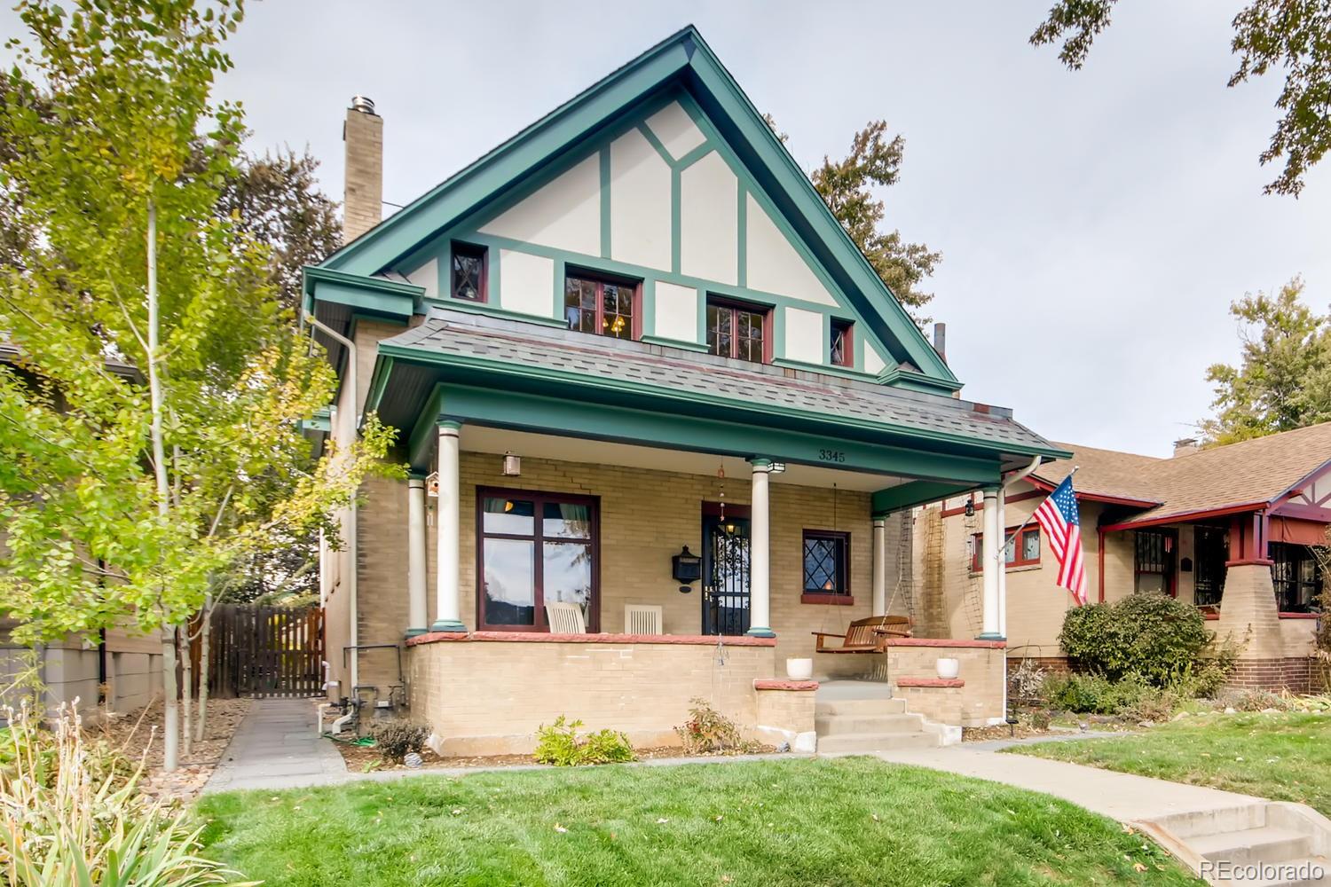3345 Raleigh Street Denver, CO 80212 - Photo 2 of 27 front view of a house with a yard
