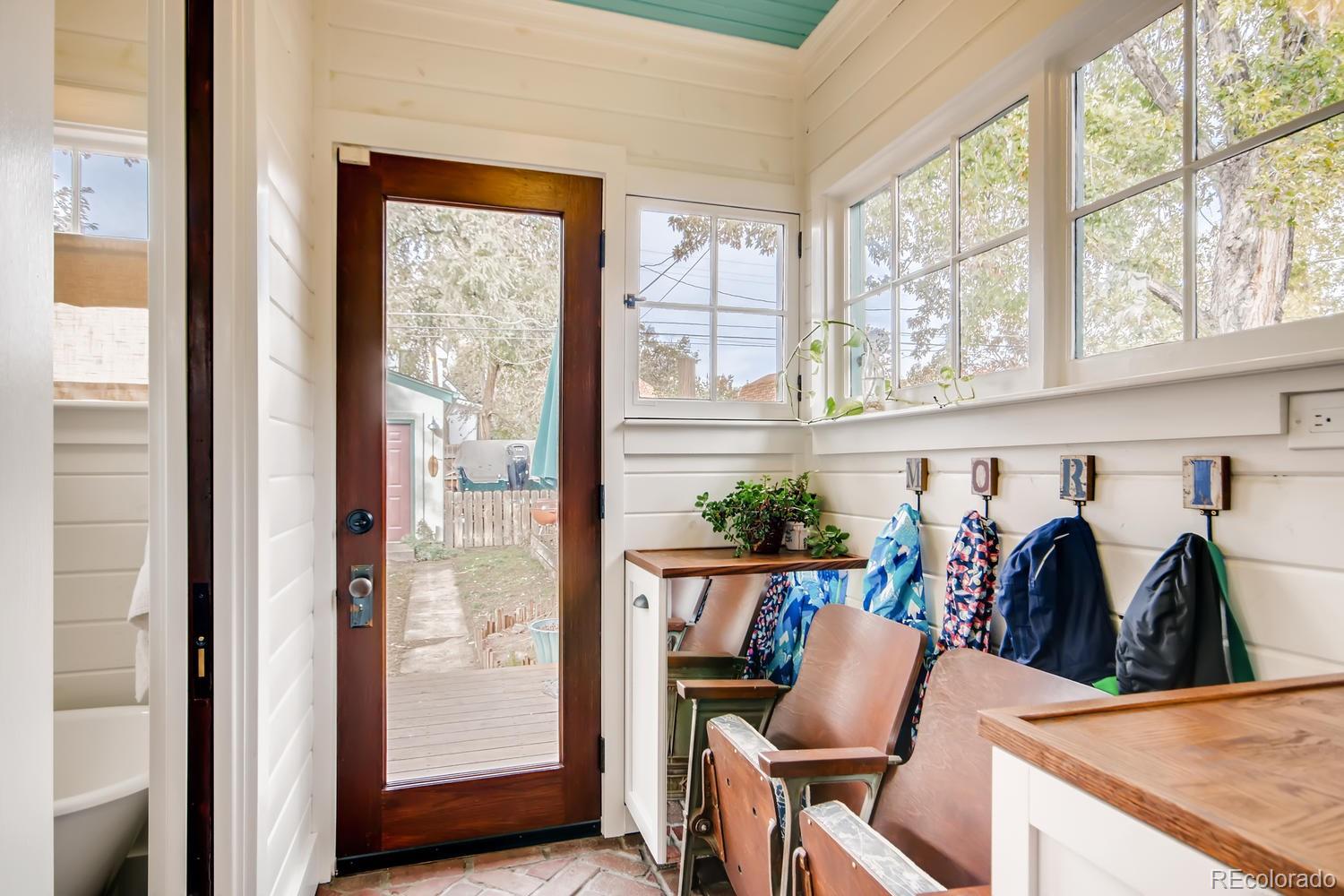 3345 Raleigh Street Denver, CO 80212 - Photo 24 of 27 a view of walk in closet with clothes and shoes