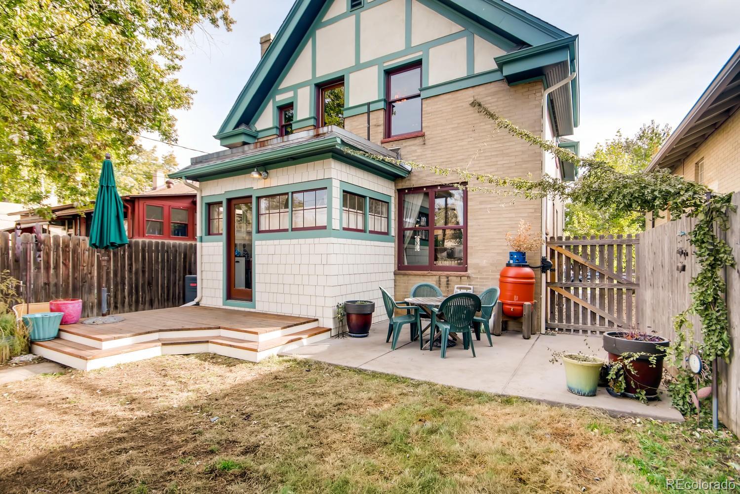 3345 Raleigh Street Denver, CO 80212 - Photo 25 of 27 a view of a house with backyard and sitting area