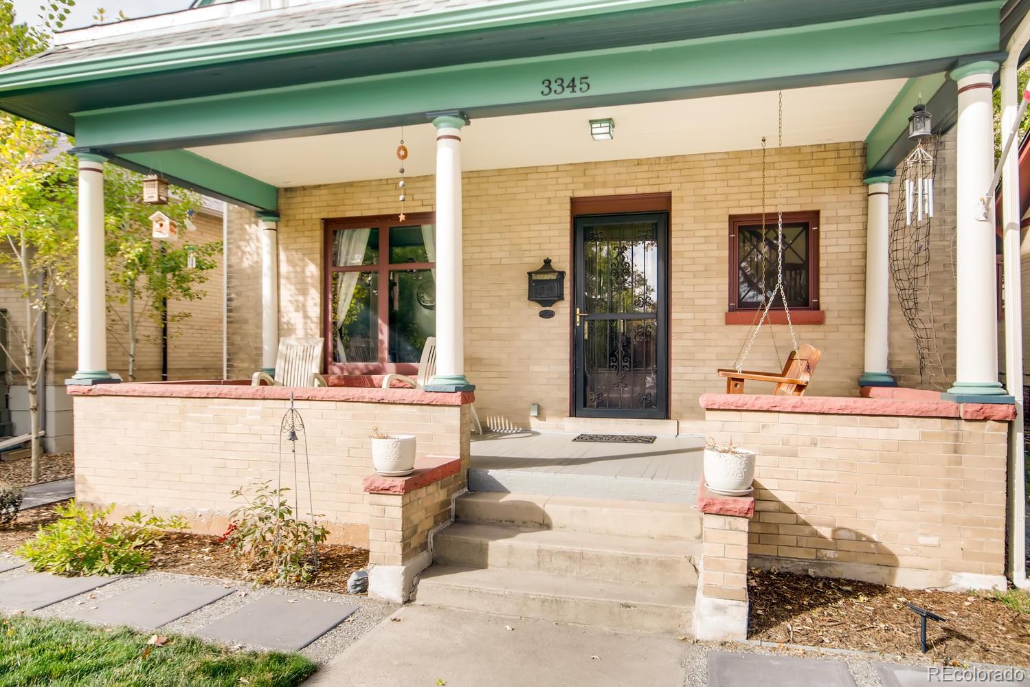3345 Raleigh Street Denver, CO 80212 - Photo 4 of 27 a swimming pool with outdoor seating