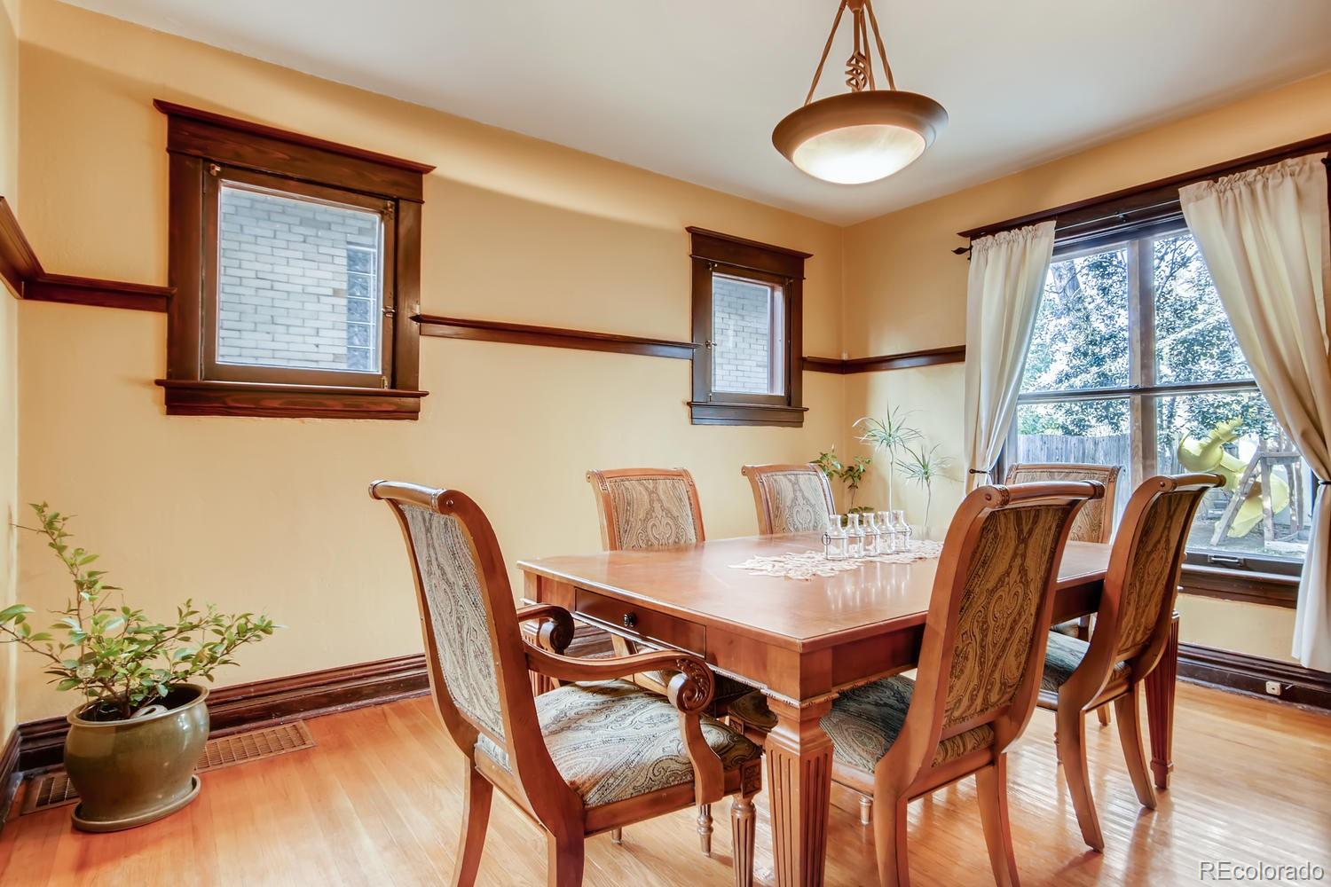 3345 Raleigh Street Denver, CO 80212 - Photo 8 of 27 a dining room with furniture and window