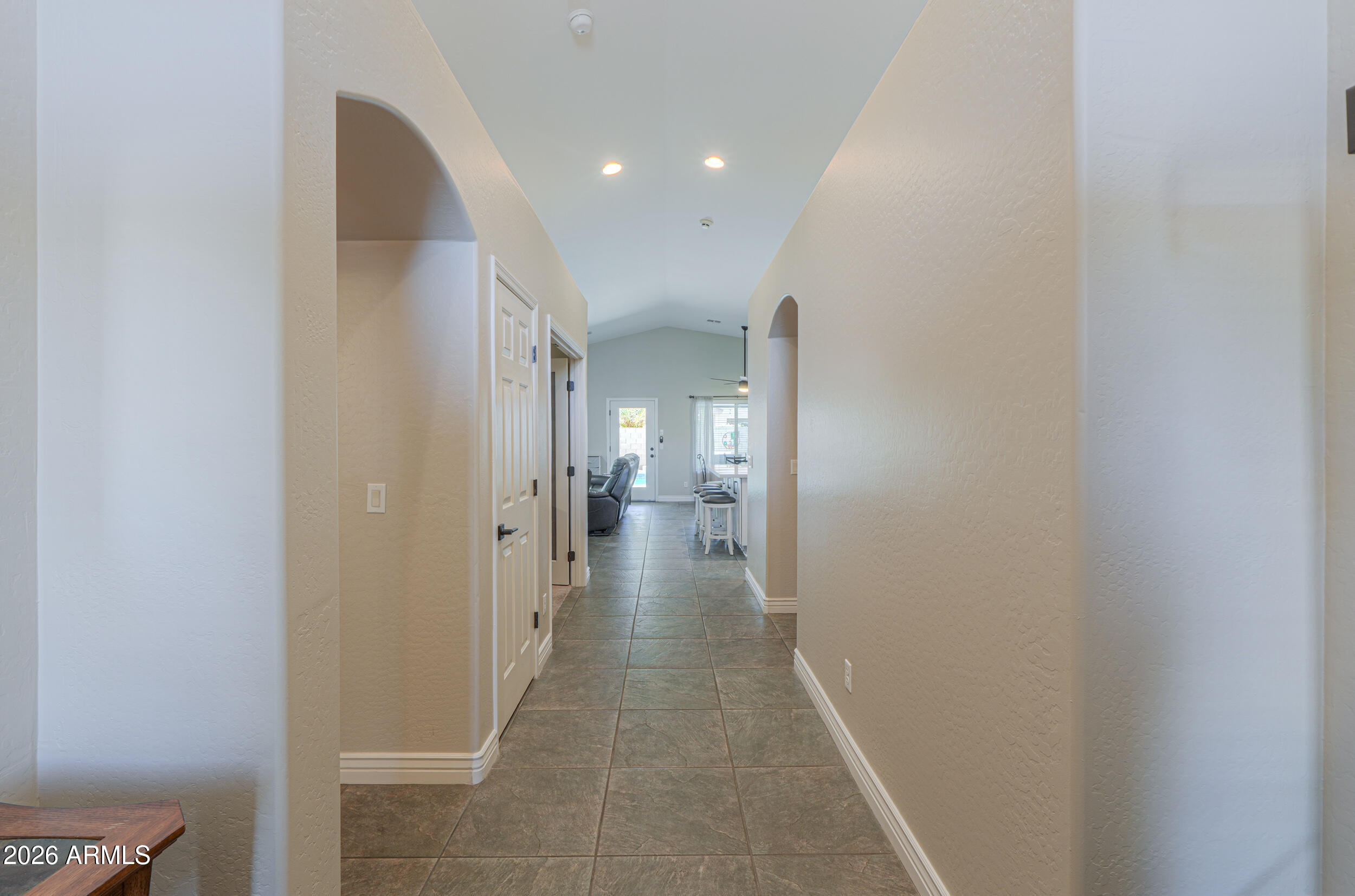 43843 Roth Road Maricopa, AZ 85138 - Photo 8 of 53 a view of a hallway with wooden floor
