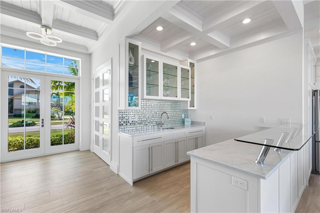 549 Hernando Drive Marco Island, FL 34145 - Photo 5 of 34 a bathroom with a sink and a vanity