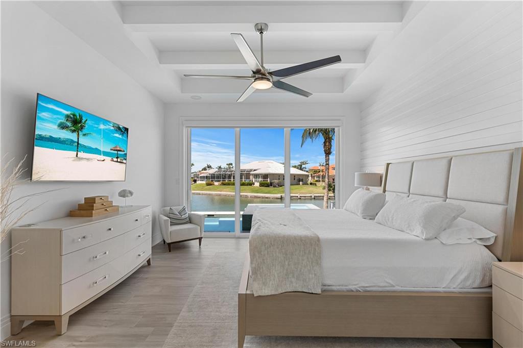549 Hernando Drive Marco Island, FL 34145 - Photo 10 of 34 a living room with furniture and kitchen view