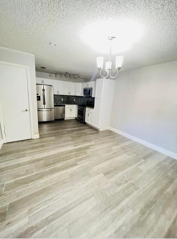 901 Hickory Street, Unit A Fort Pierce, FL 34947 - Photo 3 of 7 a view of a livingroom with a furniture
