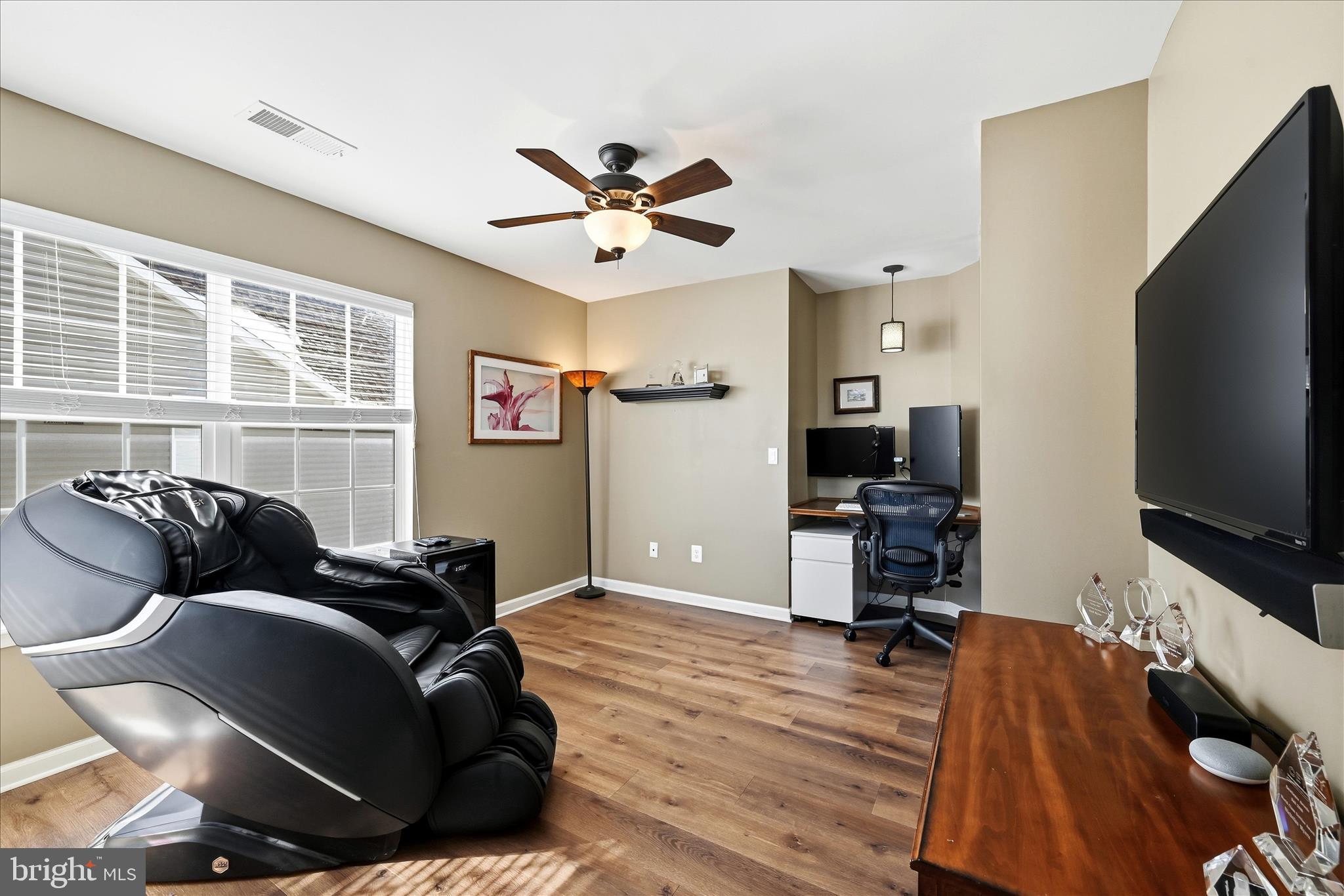 105 Garret Court Stephenson, VA 22656 - Photo 35 of 97 a living room with furniture and a flat screen tv