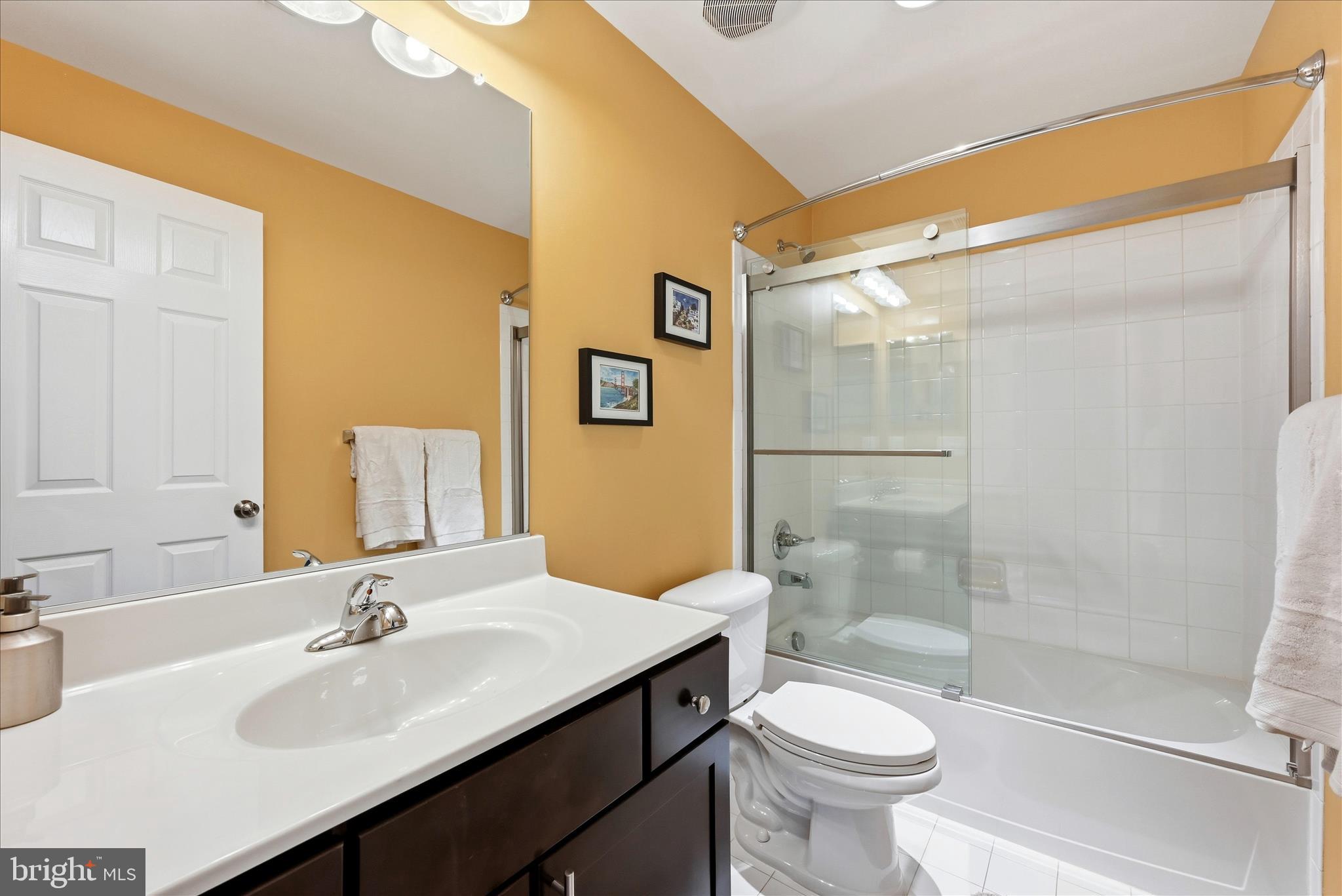 105 Garret Court Stephenson, VA 22656 - Photo 55 of 97 a bathroom with a sink a toilet and shower