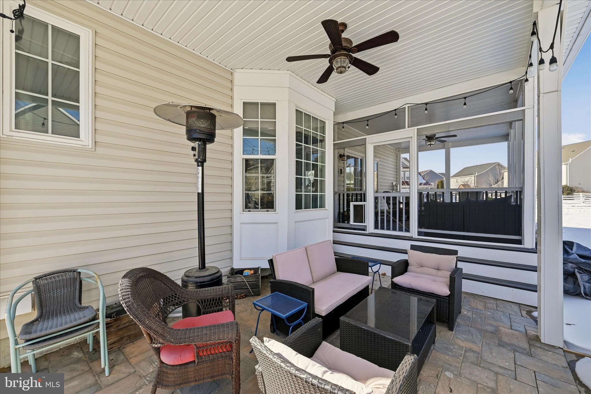 105 Garret Court Stephenson, VA 22656 - Photo 62 of 97 a outdoor space with patio the couches and a potted plant on a coffee table
