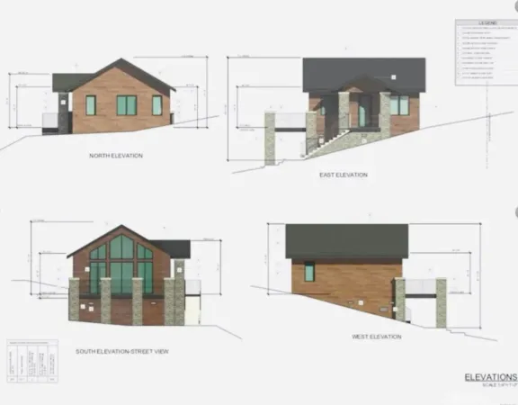 a view of a house with a street