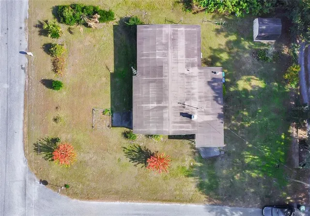 an aerial view of a city with mountains
