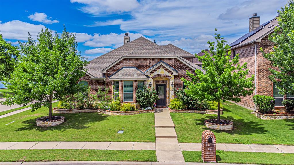 1805 Stetson Way Allen, TX 75002 - Photo 2 of 22 Brick exterior featuring stone accents and a bay window