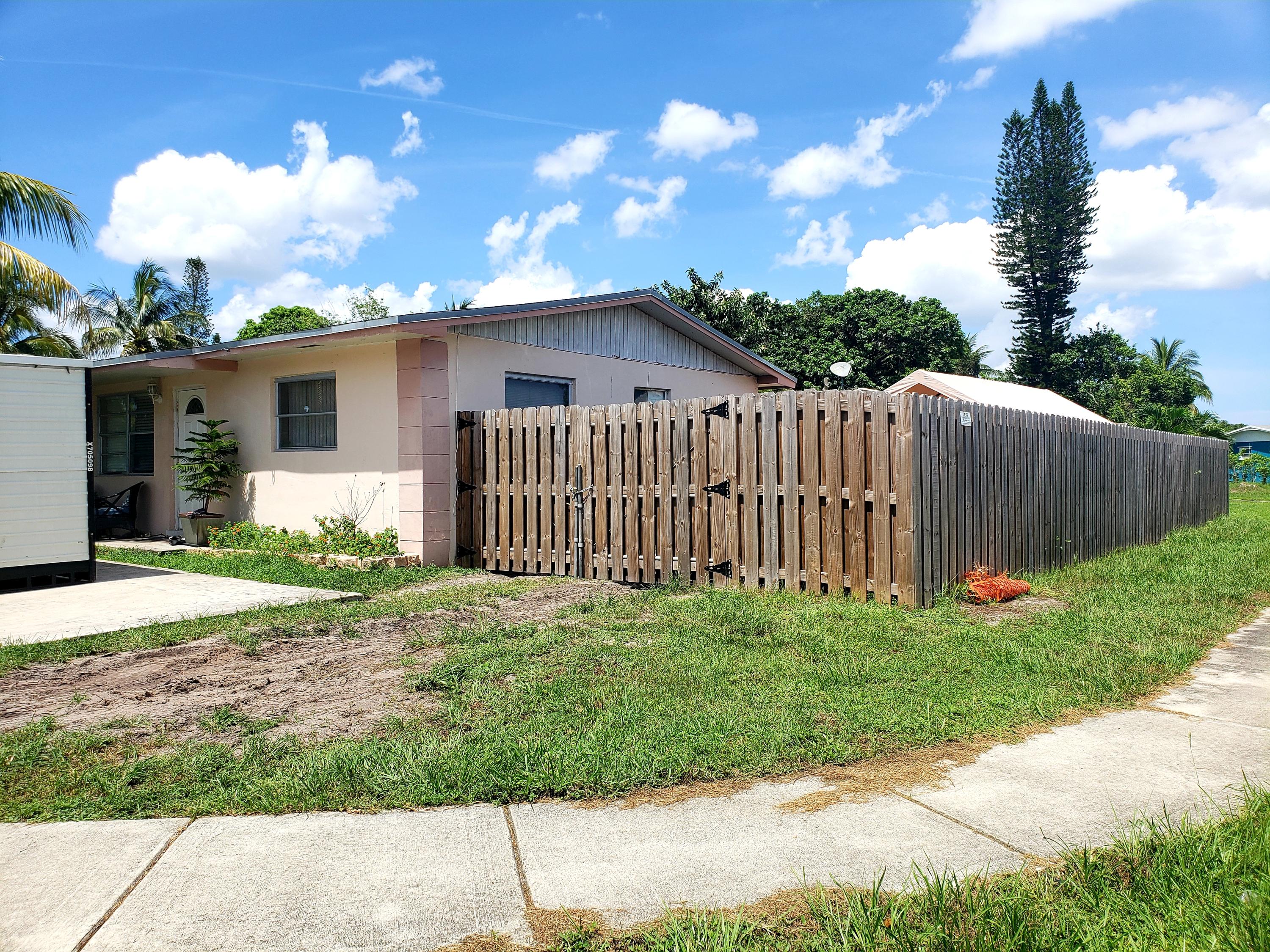6499 Southwest 3rd Court Margate, FL 33068 - Photo 16 of 16 Gates on both sides of house