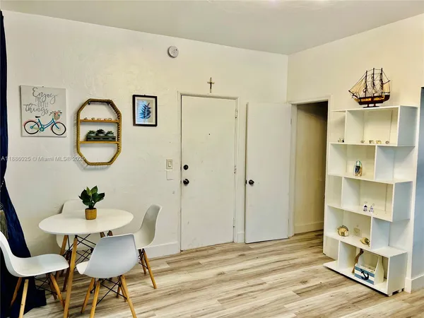 a view of a dining room with furniture