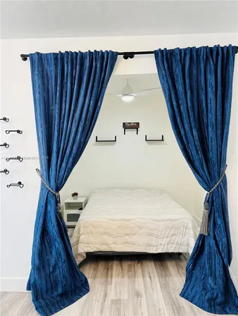 a view of livingroom with furniture and window