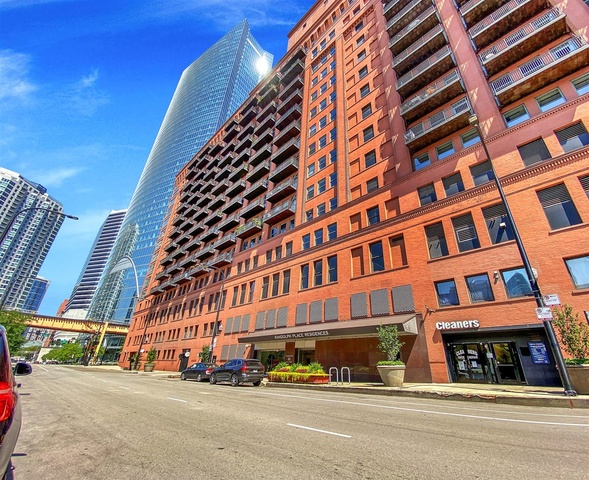 165 North Canal Street, Unit 1412 Chicago, IL 60606 - Photo 1 of 38 a view of a building and a street