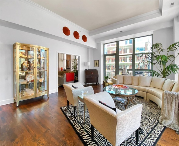 165 North Canal Street, Unit 1412 Chicago, IL 60606 - Photo 18 of 38 a living room with furniture and a large window