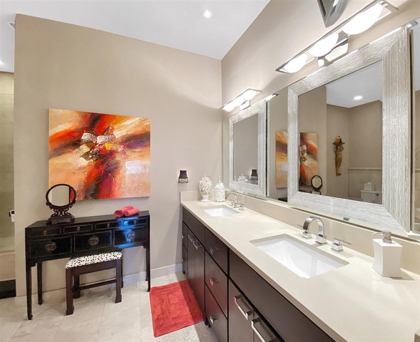 165 North Canal Street, Unit 1412 Chicago, IL 60606 - Photo 25 of 38 a bathroom with a sink double vanity and a mirror