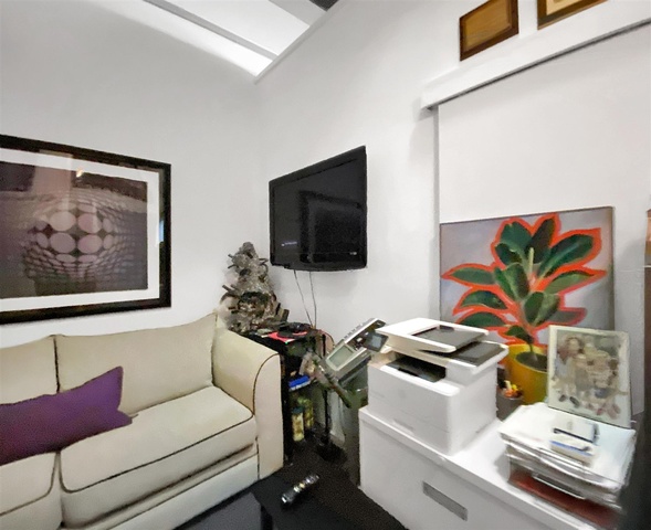 165 North Canal Street, Unit 1412 Chicago, IL 60606 - Photo 30 of 38 a living room with furniture and a flat screen tv