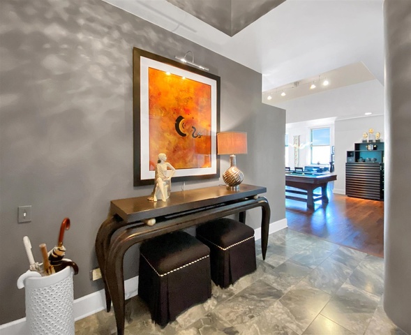 165 North Canal Street, Unit 1412 Chicago, IL 60606 - Photo 6 of 38 a living room with furniture and a wooden floor