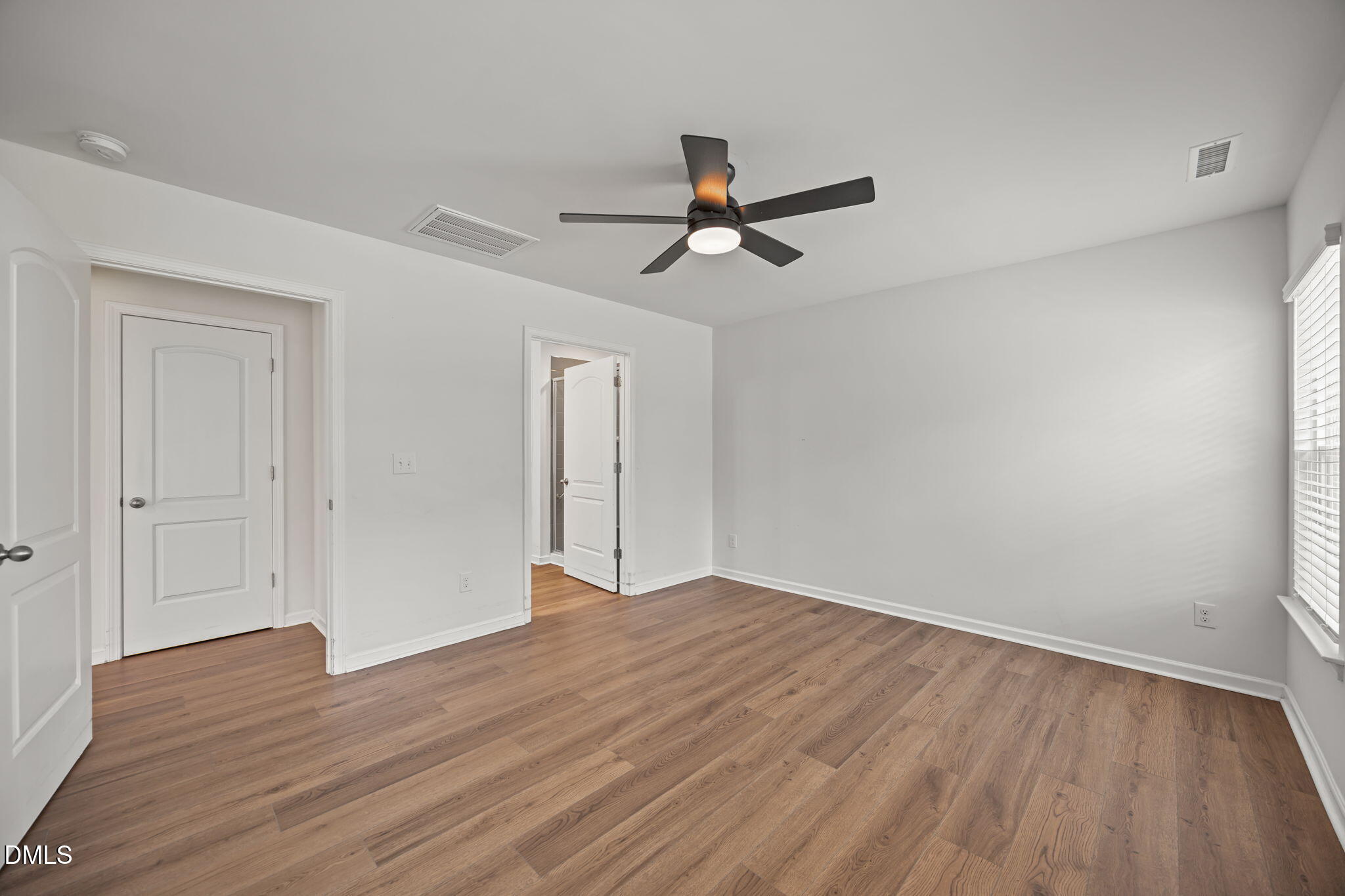 229 Summer Ranch Drive Fuquay-Varina, NC 27526 - Photo 16 of 35 a view of empty room with wooden floor