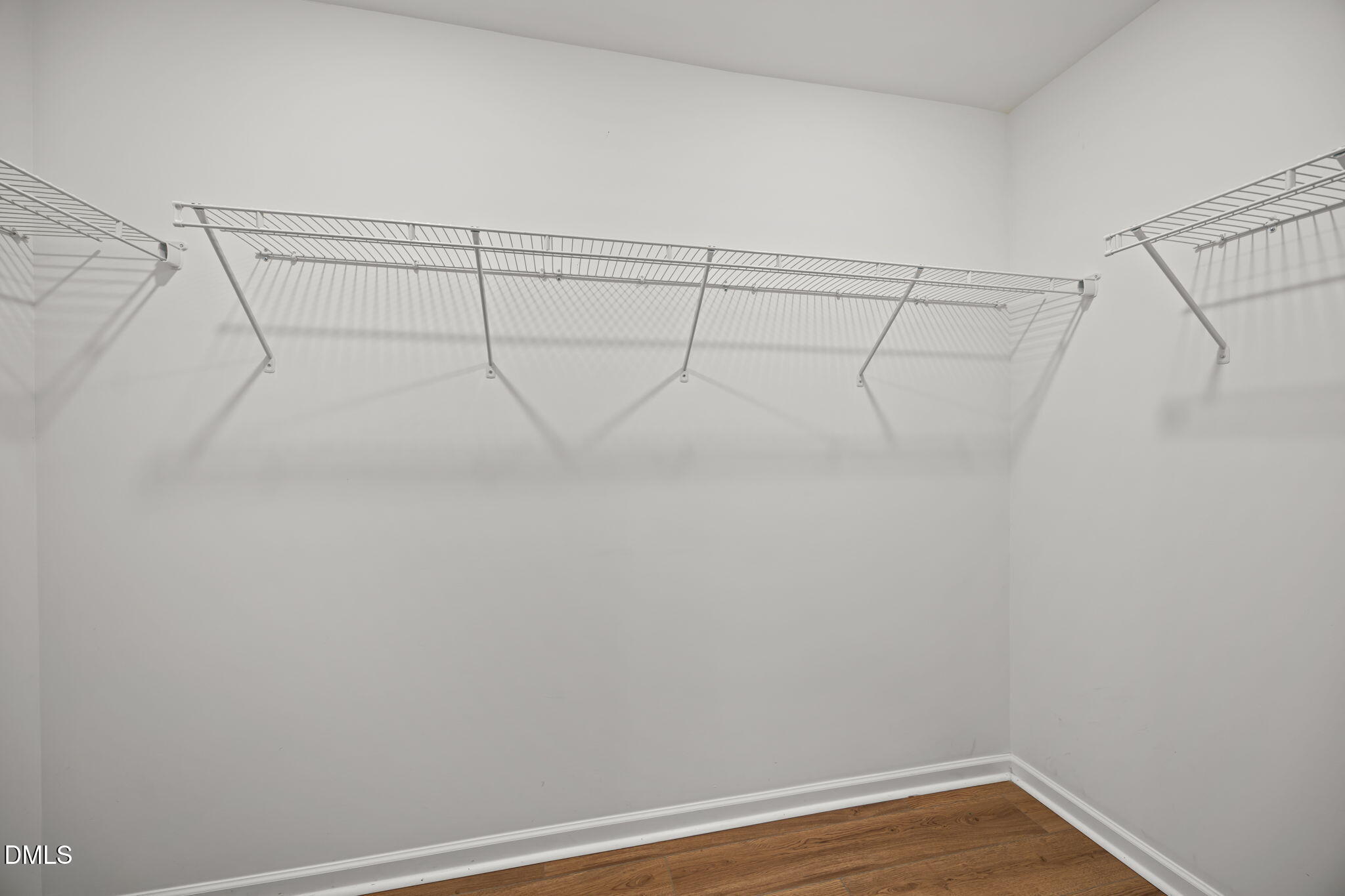 229 Summer Ranch Drive Fuquay-Varina, NC 27526 - Photo 19 of 35 a view of a room with racks on the wall