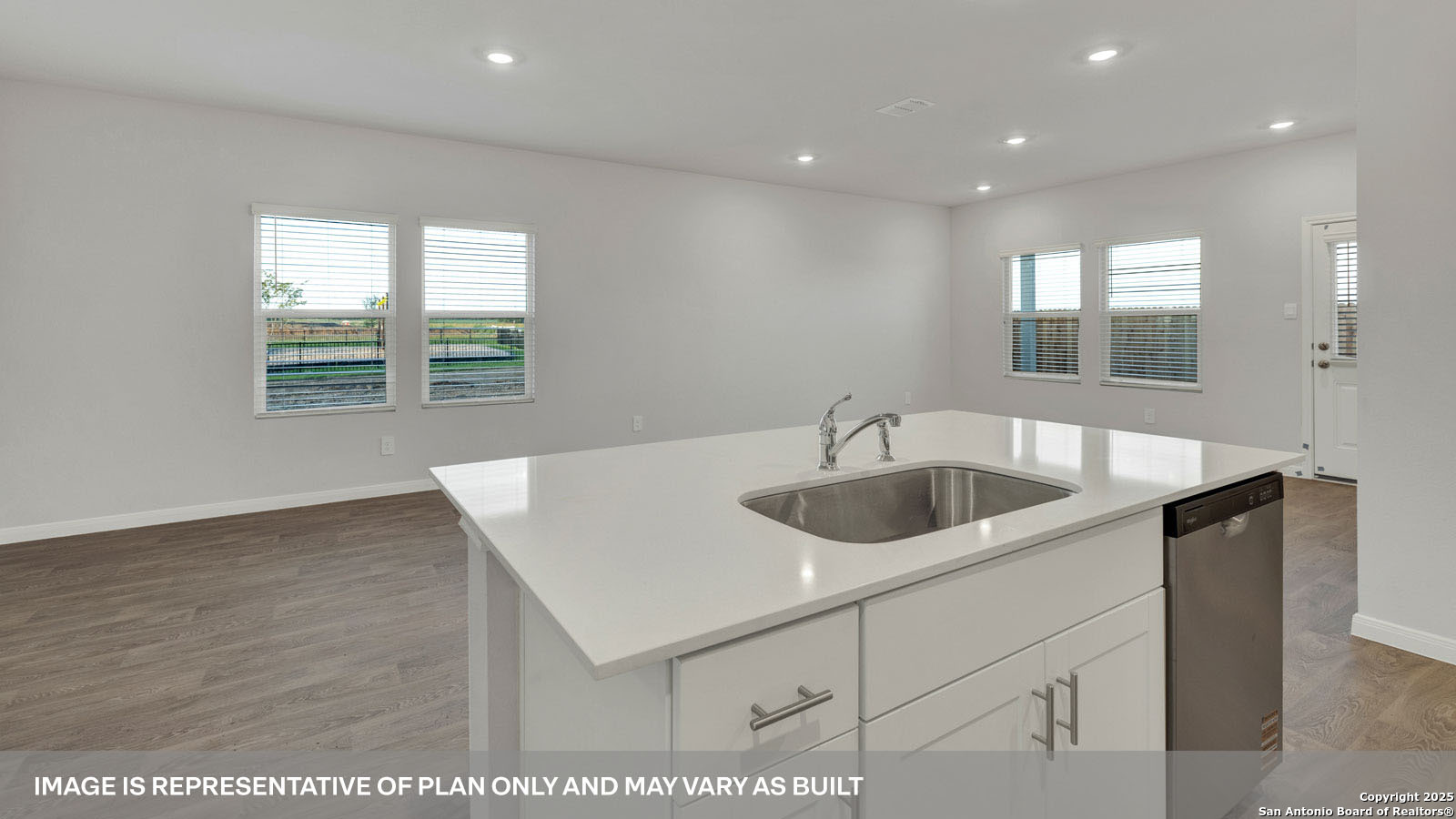 141 Raymondville Path San Marcos, TX 78666 - Photo 14 of 46 a kitchen with sink and window