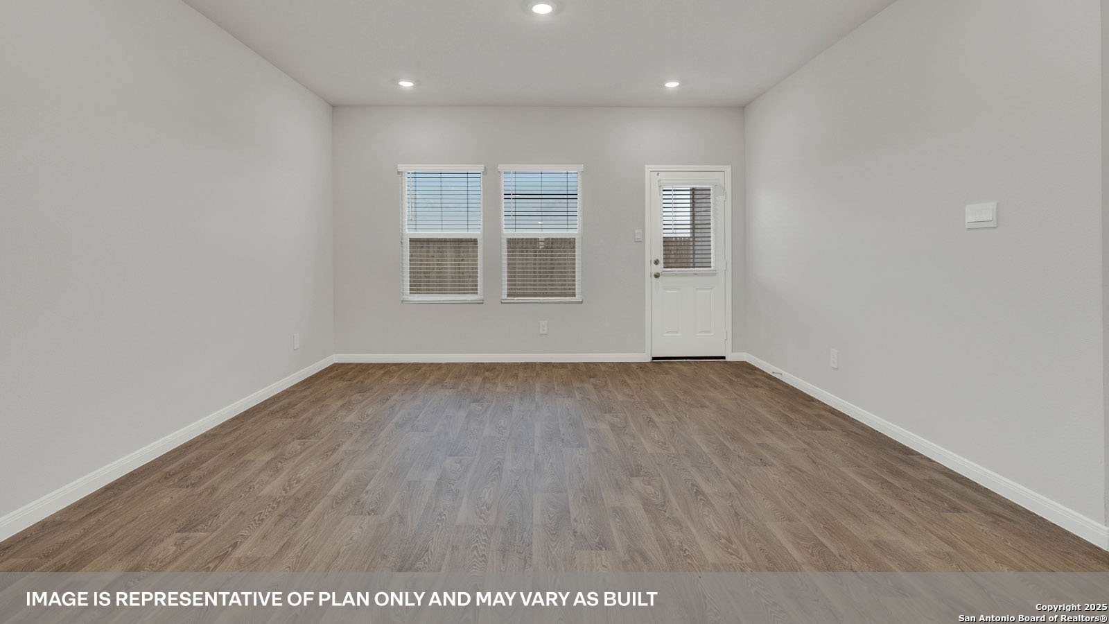 141 Raymondville Path San Marcos, TX 78666 - Photo 17 of 46 an empty room with wooden floor and windows